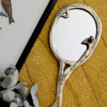 Photo 1 - Miroir à main Statuette