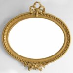 Miroir ovale à fronton