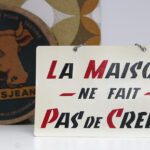 Photo 2 - La maison ne fait pas crédit Pancarte