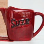 Photo 1 - Pichet Suze bordeaux